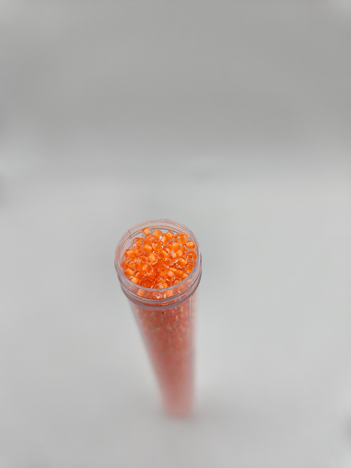 Czech Seed Bead 10/0 Crystal C/L Neon Orange